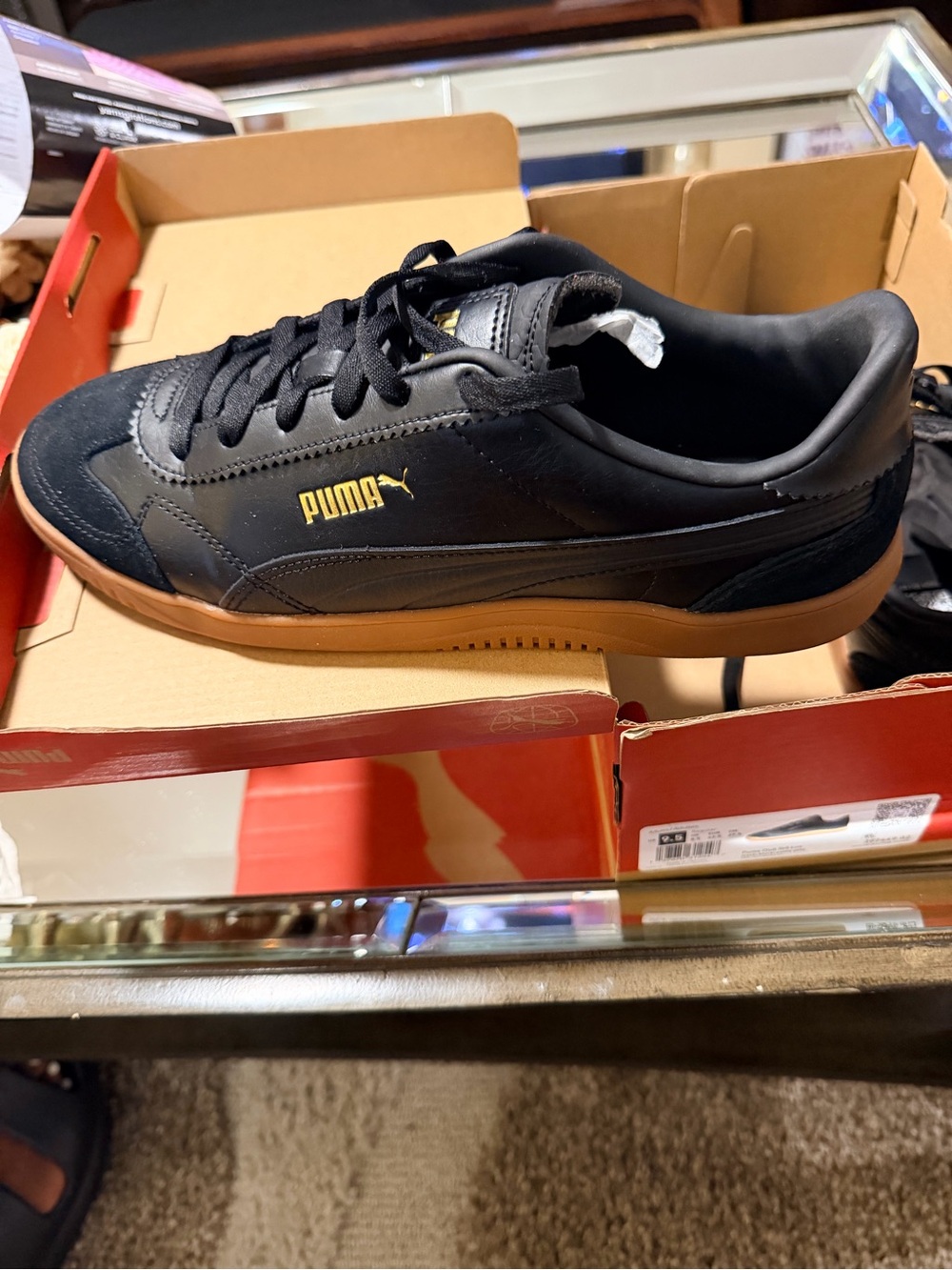 Puma Black Leather Sneakers with Gum Sole and Gold Logo